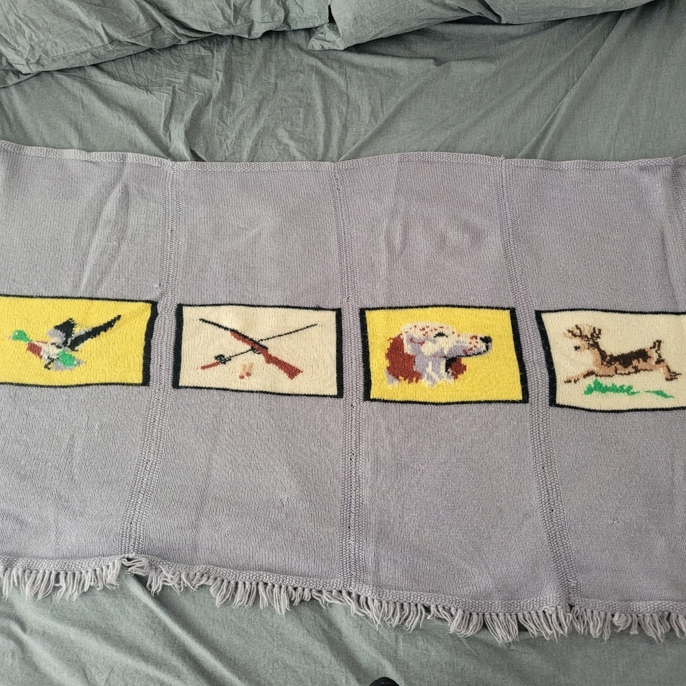 Hand knit blanket with fishing & hunting theme
